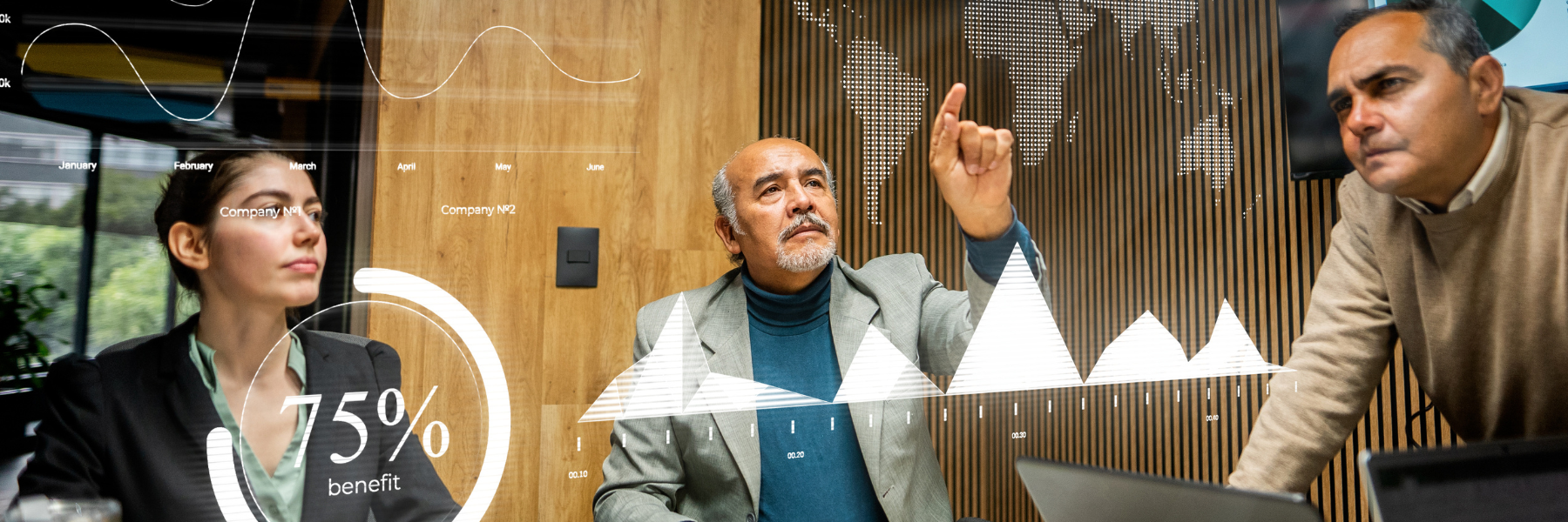 Three business people using an interactive screen