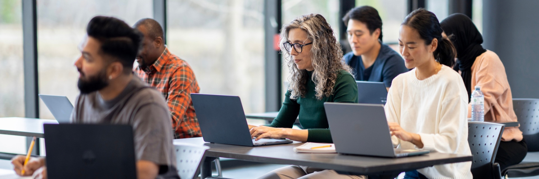 Adults learning in a classroom