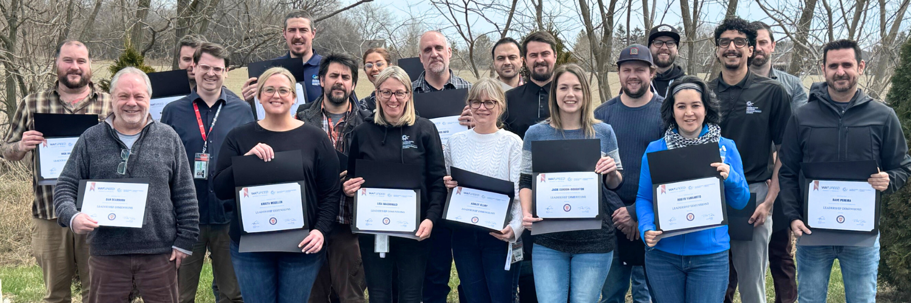 Members of the CNL team pose with their program certificates