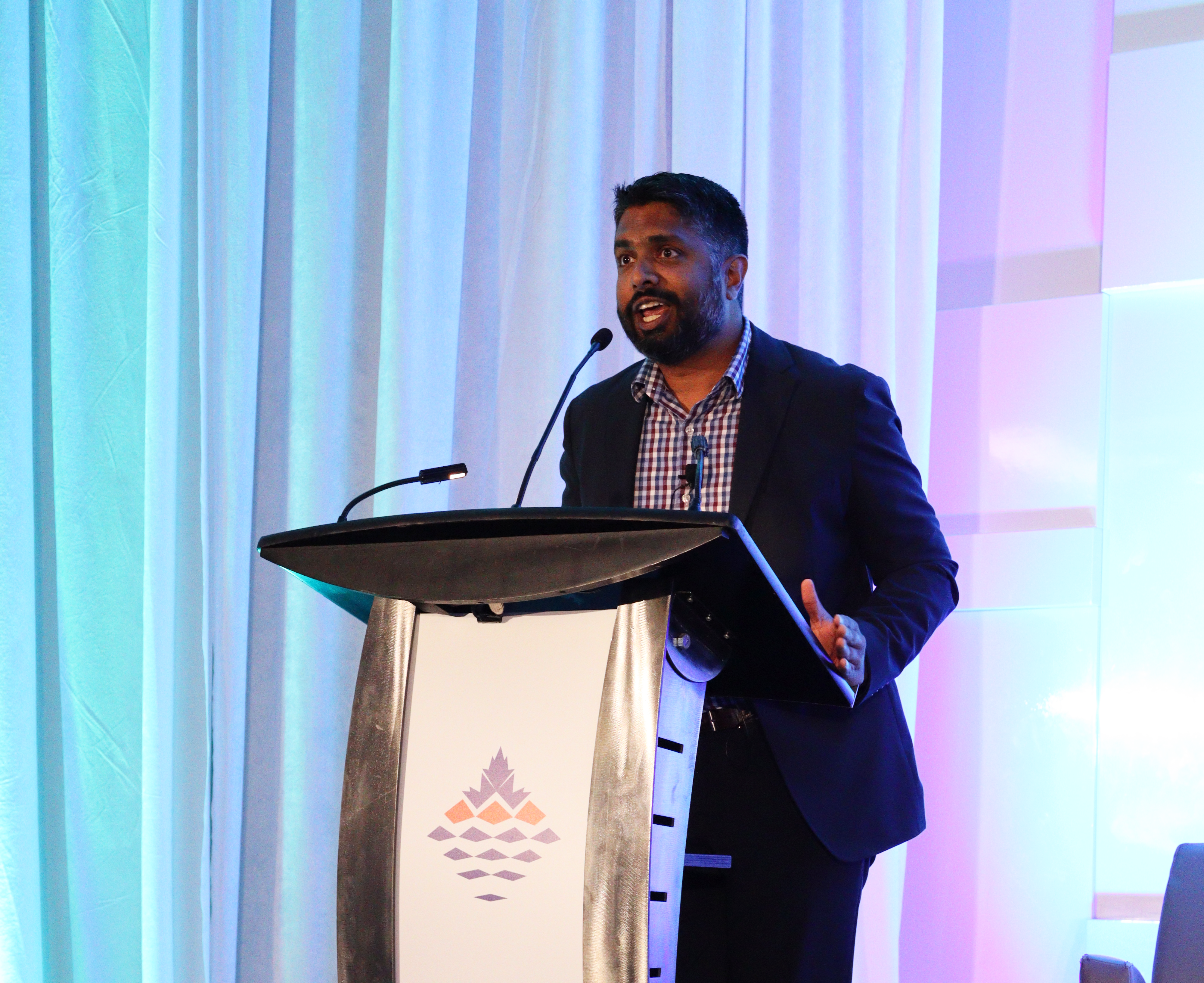 Image of Aaron Pereira speaking at 2023 IPAC Annual Conference