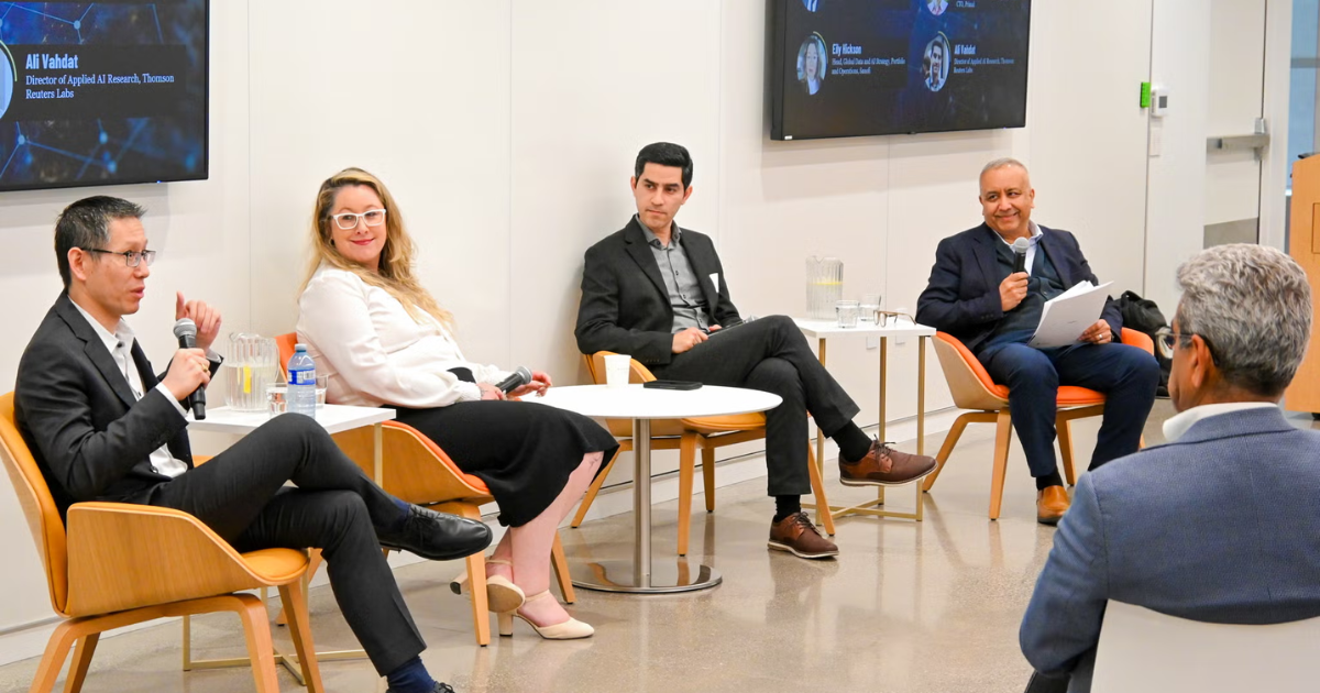 Panelists addressing the audience